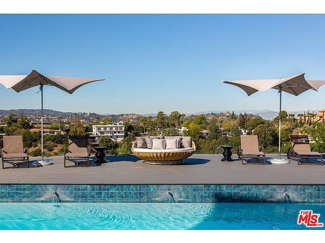 couple-pool-view-can-easily-mistaken-resort