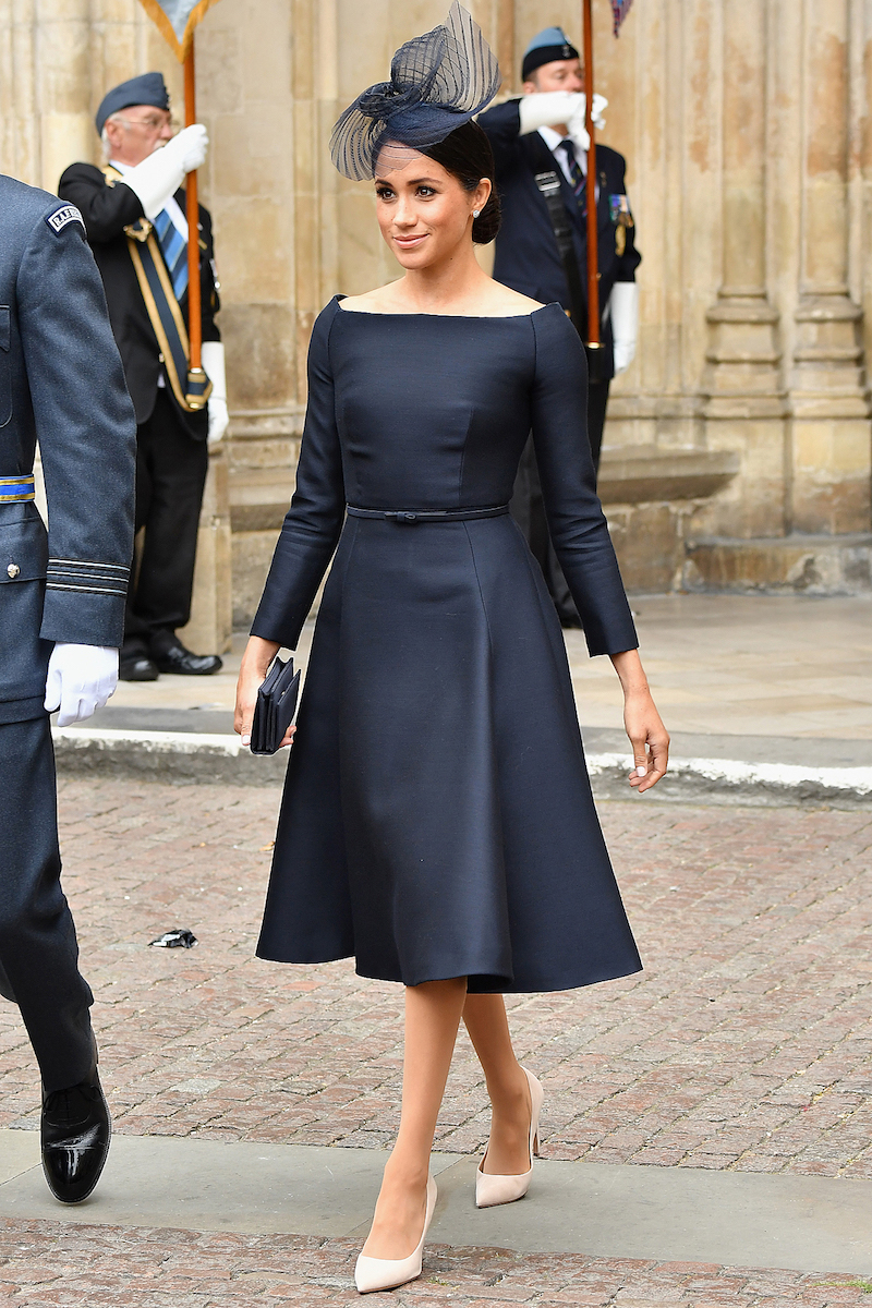 Meghan Markle Wore the Most Dramatic Cape With Audrey Hepburn-Approved  Ankle Pants