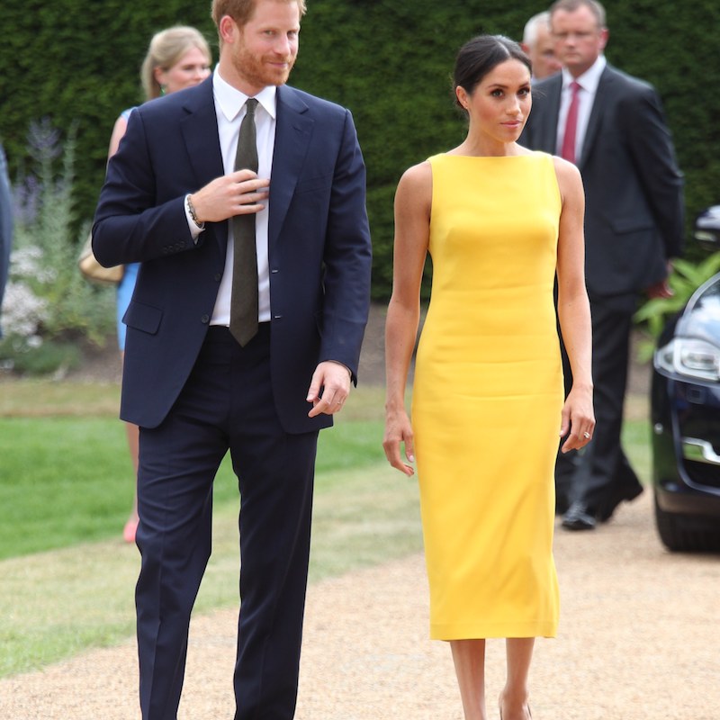 Meghan Markle Wore the Most Dramatic Cape With Audrey Hepburn-Approved  Ankle Pants